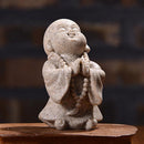 Buddha Statuette with Praying Buddhist Monk