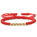 Braided-Gold-Buddhist-Bracelet